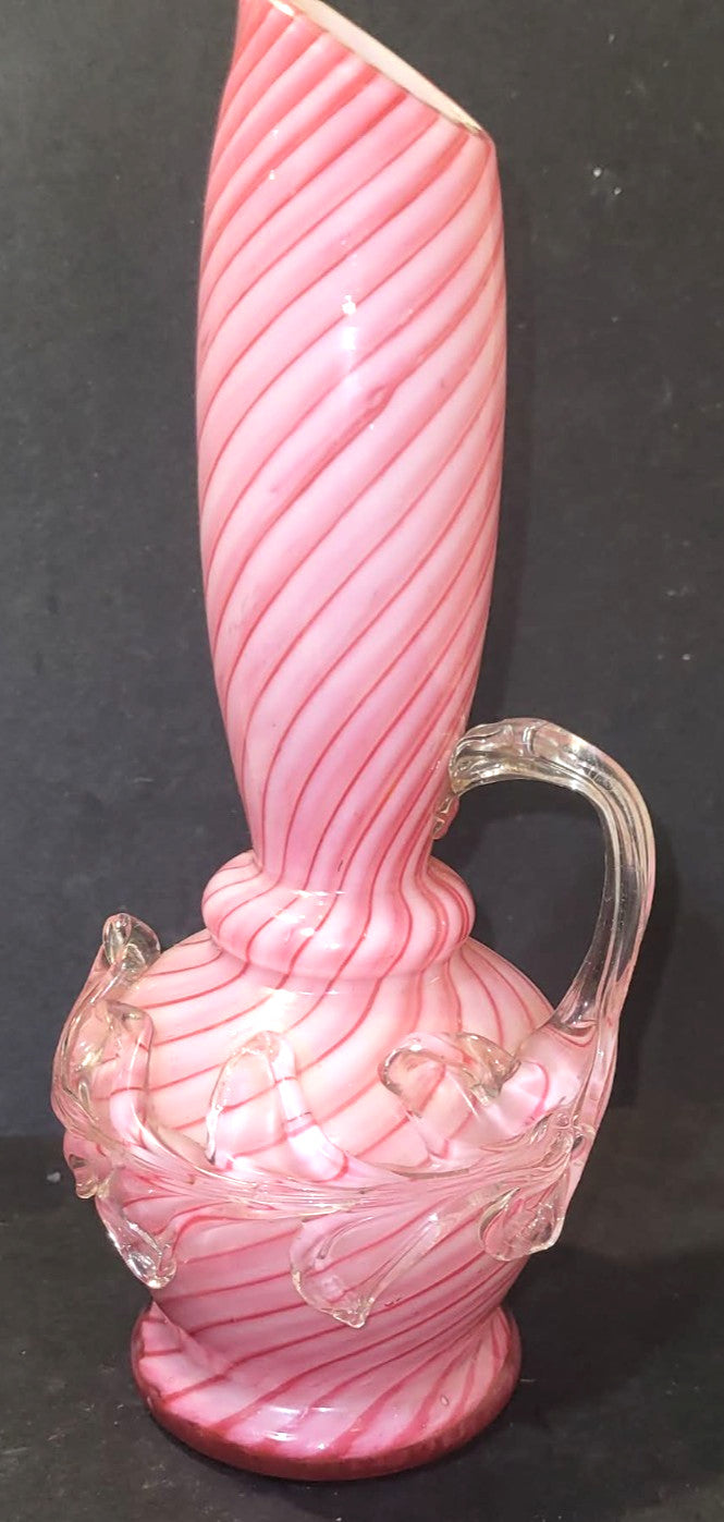 Vintage pink & white spiral cased art glass ewer with applied clear glass leaves