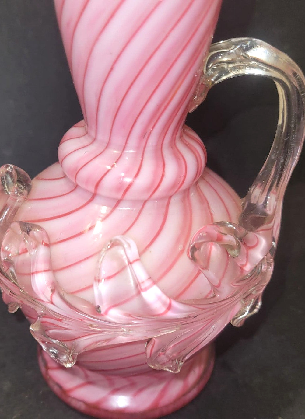 Vintage pink & white spiral cased art glass ewer with applied clear glass leaves