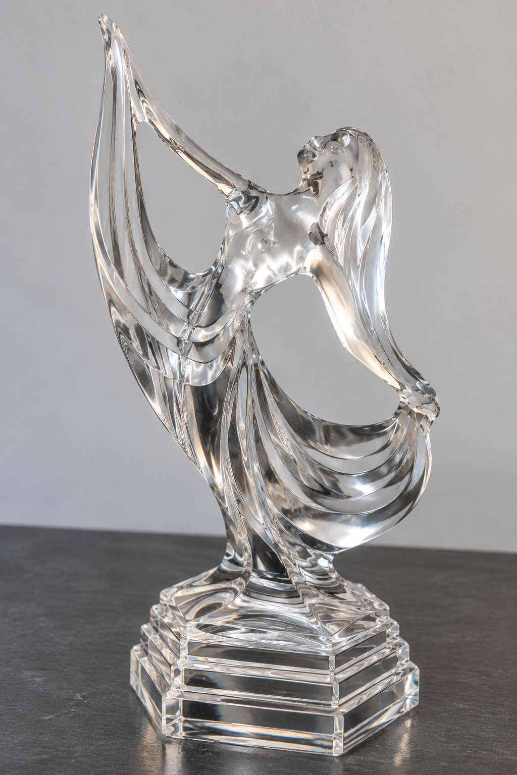 RCR Italian clear lead crystal dancing lady figurine standing on a faceted pedestal, approximately 11 inches tall