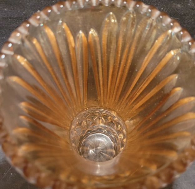 Interior and moulded base of the Canning Town marigold carnival glass Thistle vase